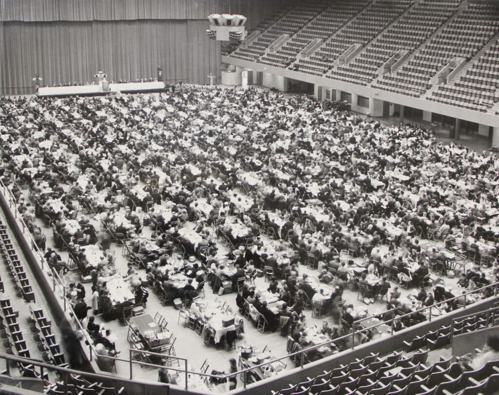 hundreds gather for a birds eye view of the tables in veterans auditorium 1961 Delegate Assembly